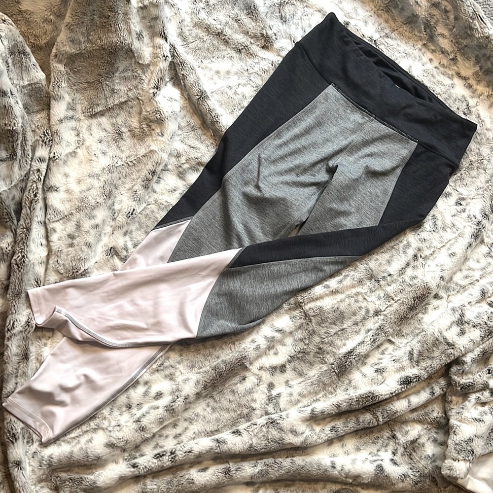 Like New!   Super cute multi colored exercise tights.